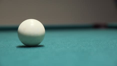 sinking the black 8-ball to win a game of billiards