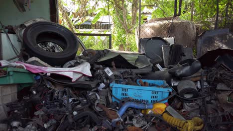 dirty old garage filled with chaotic mess of all kinds of stuff