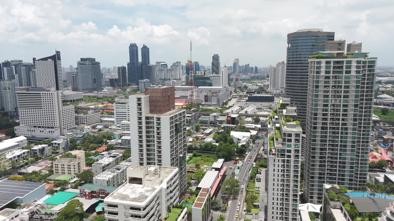 Phrom Phong Skyline At Daytime In Bangkok, Thailand - Drone Shot