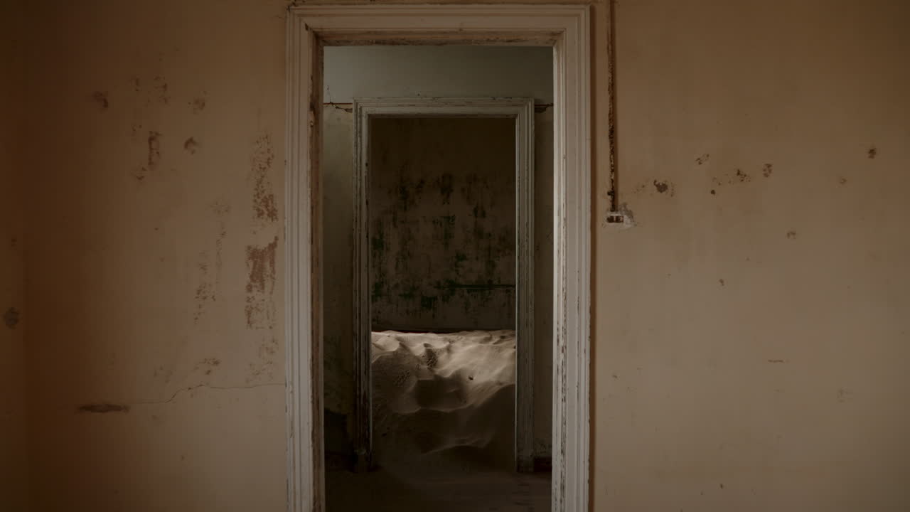 Abandoned Interior with Sand-Filled Room