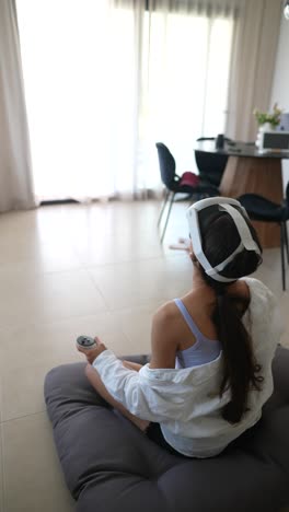 woman enjoying vr experience at home