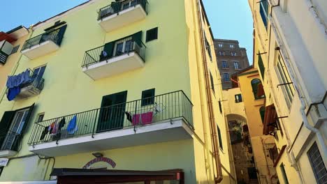 vibrant buildings with balconies and laundry in sorrento