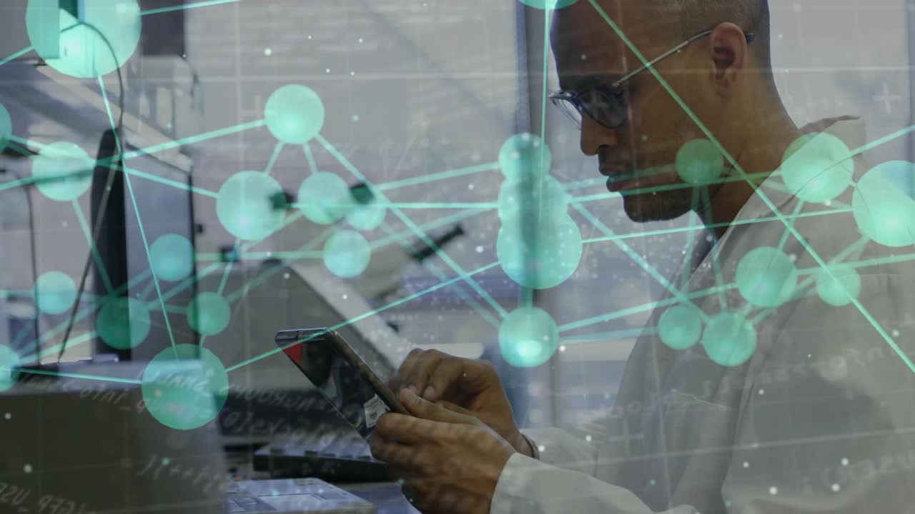 Lab researcher tapping tablet and initiating teal network animating across monitors, analyzing data