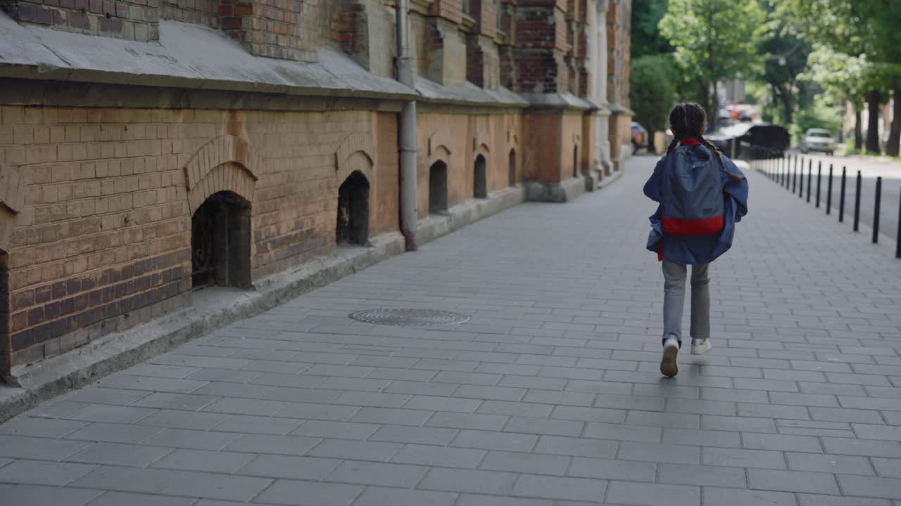 Schoolgirl Running to School