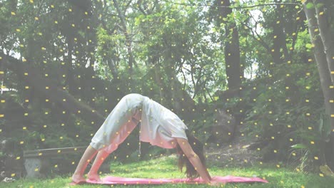 animation of social distancing message over caucasian woman stretching