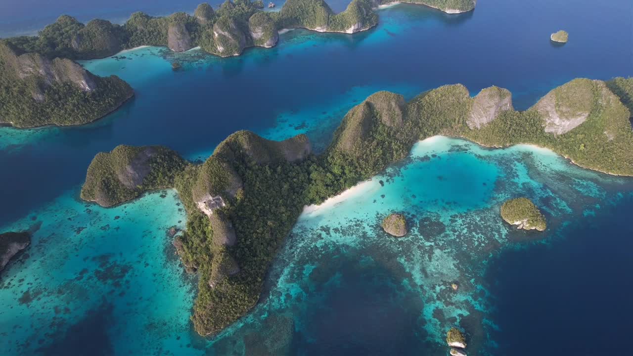 Incredible view on island formations with white sand beaches and coral reefs in Raja Ampat, Wayag, Indonesia. Lost Paradise