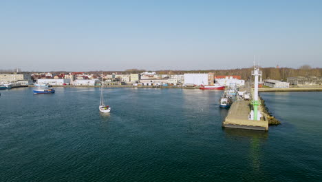 sailboat arriving at port hel in poland at summer