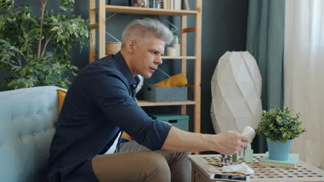 man at home dealing with illness