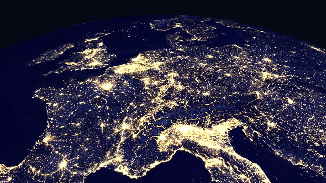 Digital animation zooms from a rotating Earth to illuminated city lights across Europe and France