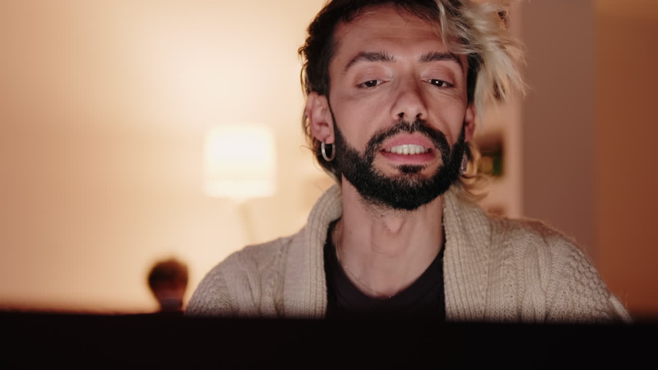 Gay Couple Working From Home at Night