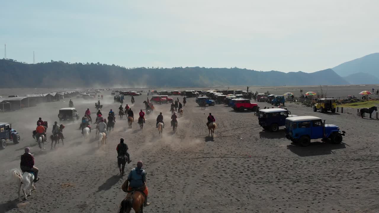 Bromo volcano with horses and jeeps, East Java, Indonesia
