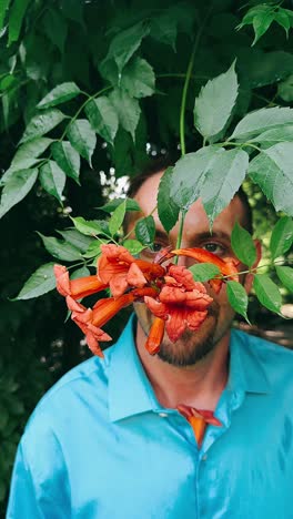 man with orange flowers