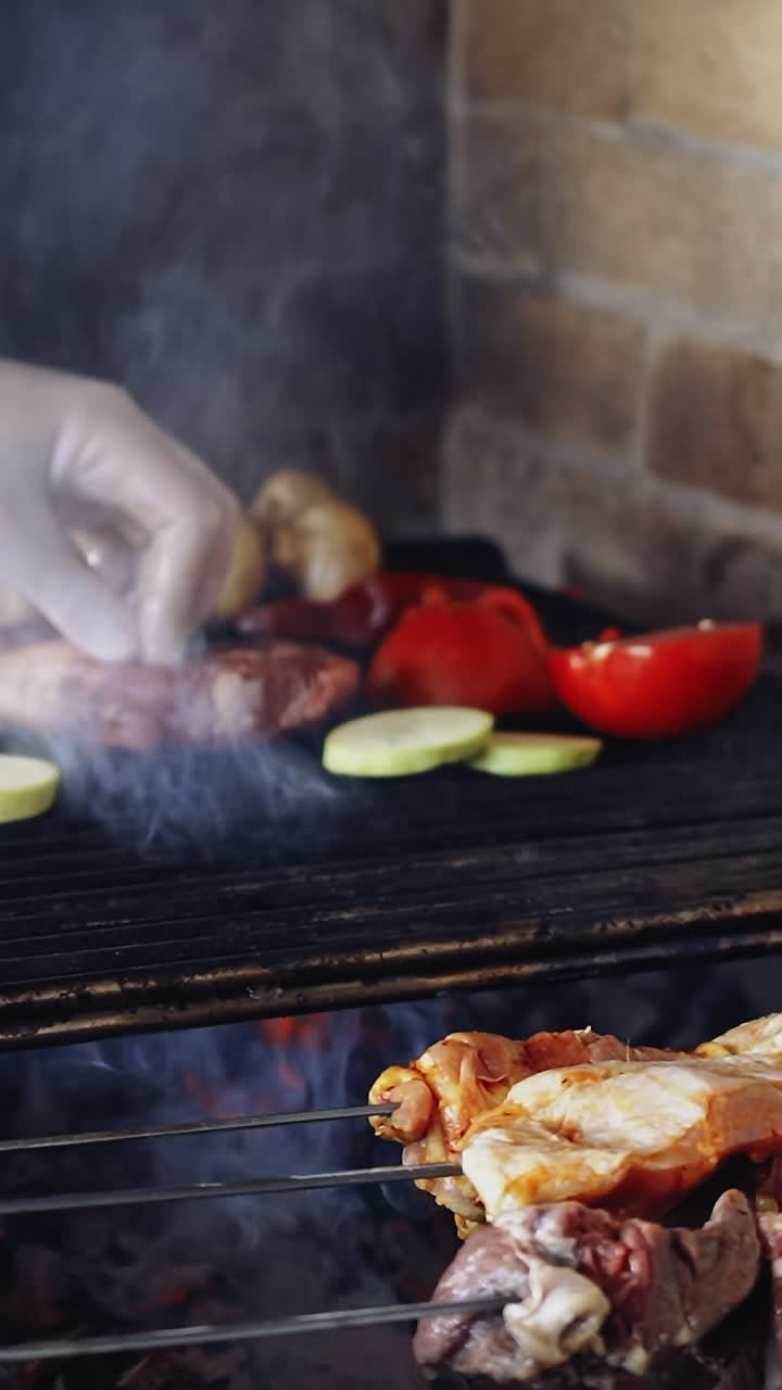 Grilled meat skewers. Meat preparing on barbecue grill over charcoal