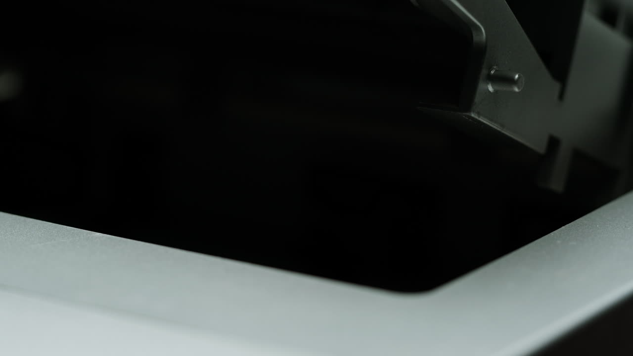 Cassette tape player, Close-up of a spinning vintage audio cassette in tape recorder. Retro magnetic cassette plays music. selective focus, shallow depth of field