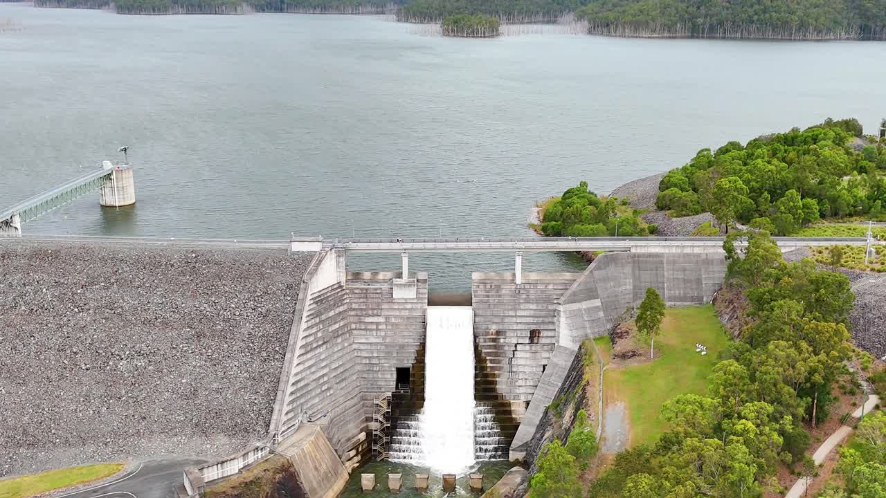 Aerial View of a Dam and Waterfall
