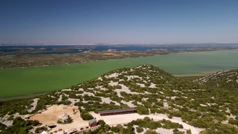 Captivating-bird-eye-view-of-the-famous-Naturpark-Vransko-Jezero,-Vrana-Lake-Nature-Park,-Croatia