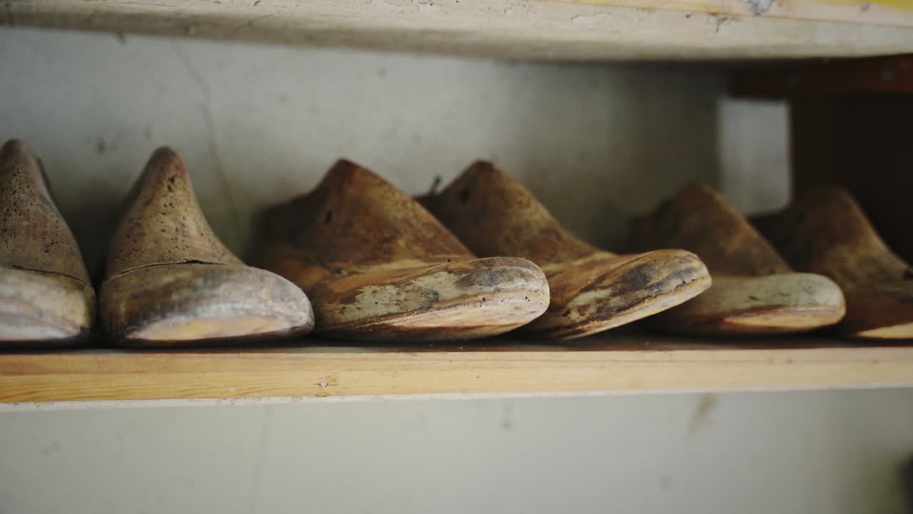 Old cobbler's molds on a shelf