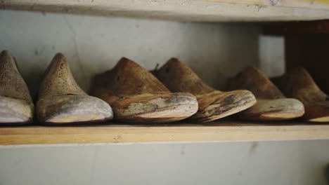 Old-cobbler's-molds-on-a-shelf