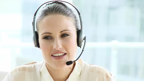 Female-executive-with-headset-on