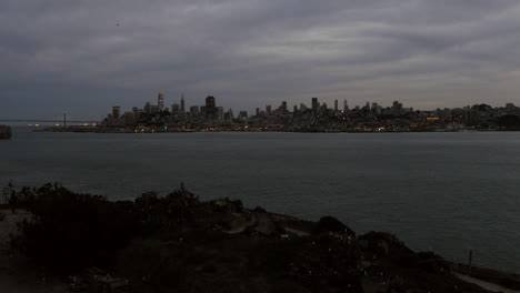 downtown san francisco with bay bridge traffic time lapse shot in 4k high resolution