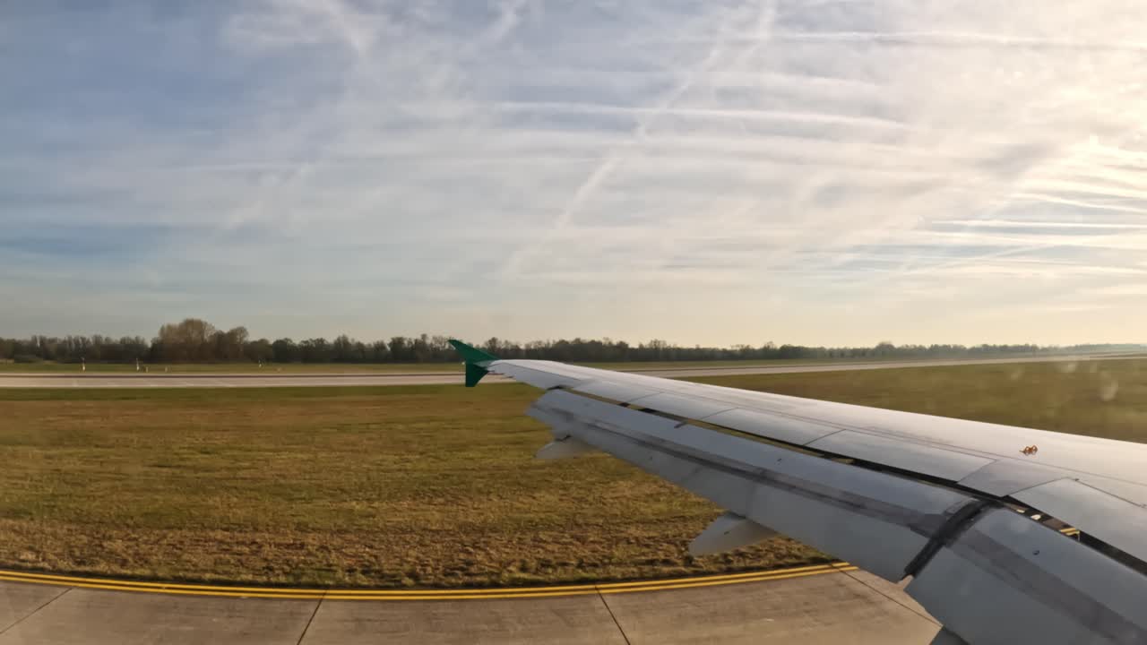 View from a plane window just after landing, showing the peaceful German landscape.