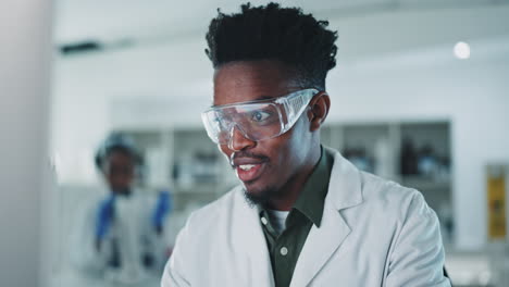 black man, scientist and typing with data