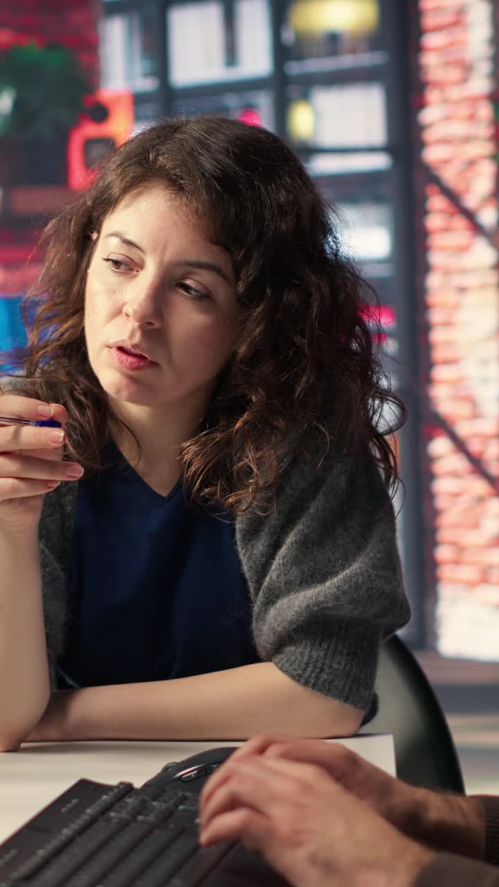 Vertical Video Man and woman creative team using AI to generate image models