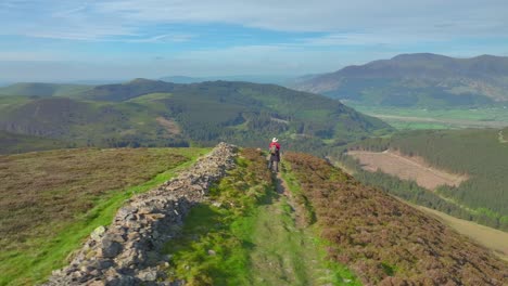 mountain walker on mountainside path