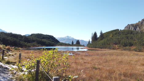 Wide-angle-nature-4k-image-of-Wiegensee-lake-and-mountain-alps-in-Austria