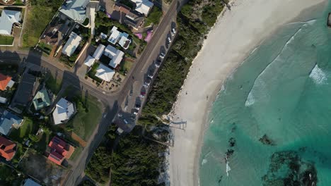 urban beach top down view with zoom in speed ramp effect, aerial dynamic