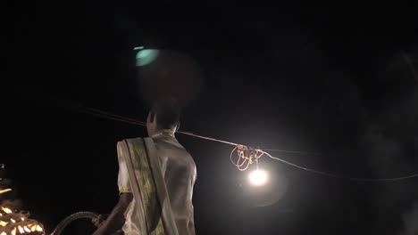 Nighttime-Shot-of-Ganga-Aarti-Candelabra