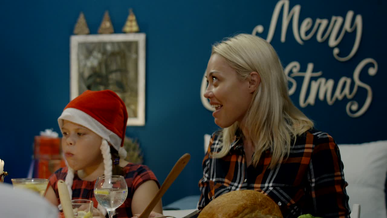 Man carving turkey on Christmas dinner