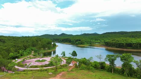 aerial view of ho thuy tien abandoned water park with huge dragon structure and empty lake in hue, vietnam