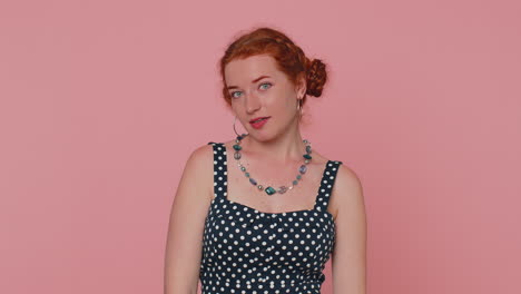 upset young redhead woman making face palm unhappy gesture, shame on you, disappointed in result