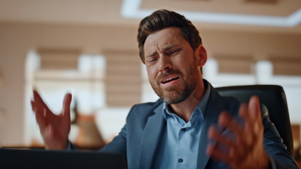 Shocked man arguing laptop workplace closeup. Stressed businessman gesturing