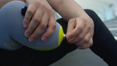 man putting on below knee prosthesis