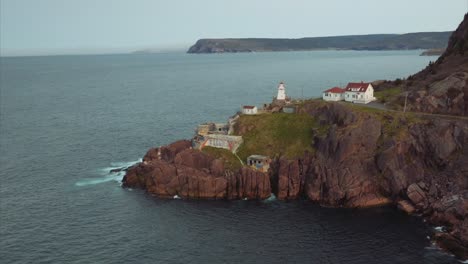 the famous fort amherst with towering white lighthouse on rocky point overlooking the blue atlantic ocean