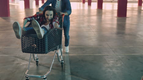 young caucasian group of friends having fun in a empty parking