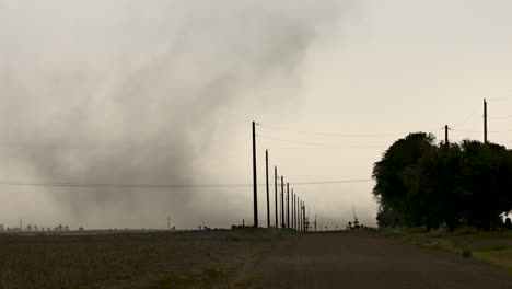 dust storm over rural road
