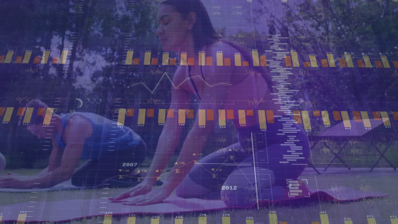 Yoga partners practicing poses in park, digital bar charts floating above tracking fitness metrics