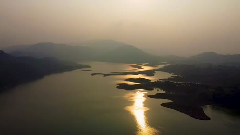 pristine lake at the edge of mountain forests aerial shots at evening video is taken at umiyam lake shillong meghalaya india