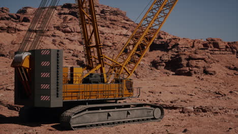 large yellow crane in a desert landscape