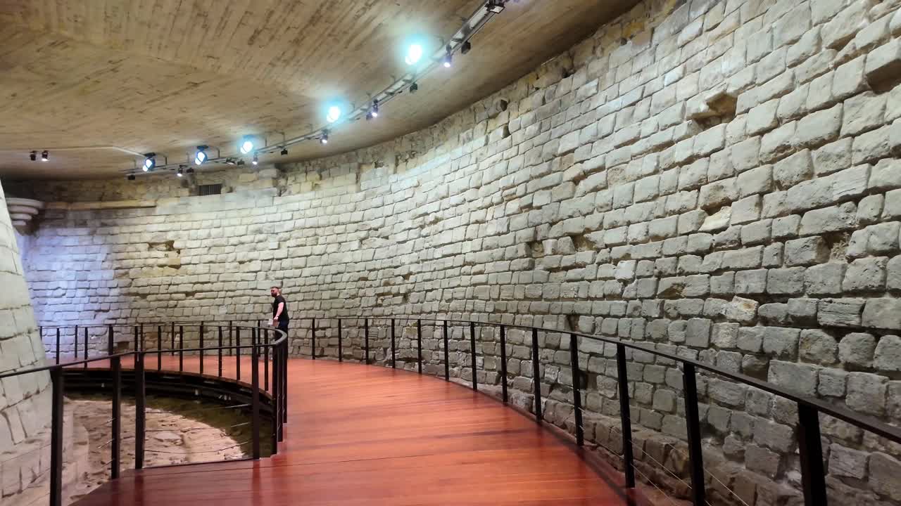 Remains of the medieval fortress of the Louvre. Dry moat, ditch surrounding the keep.