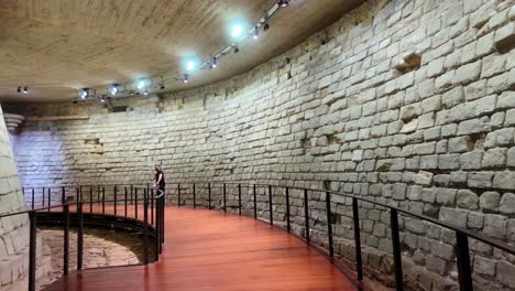 remains of the medieval fortress of the louvre. dry moat, ditch surrounding the keep.