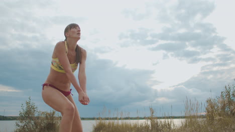 female beach volleyball players are making forearm pass bump and attacking other teams in jump training of two professional teams