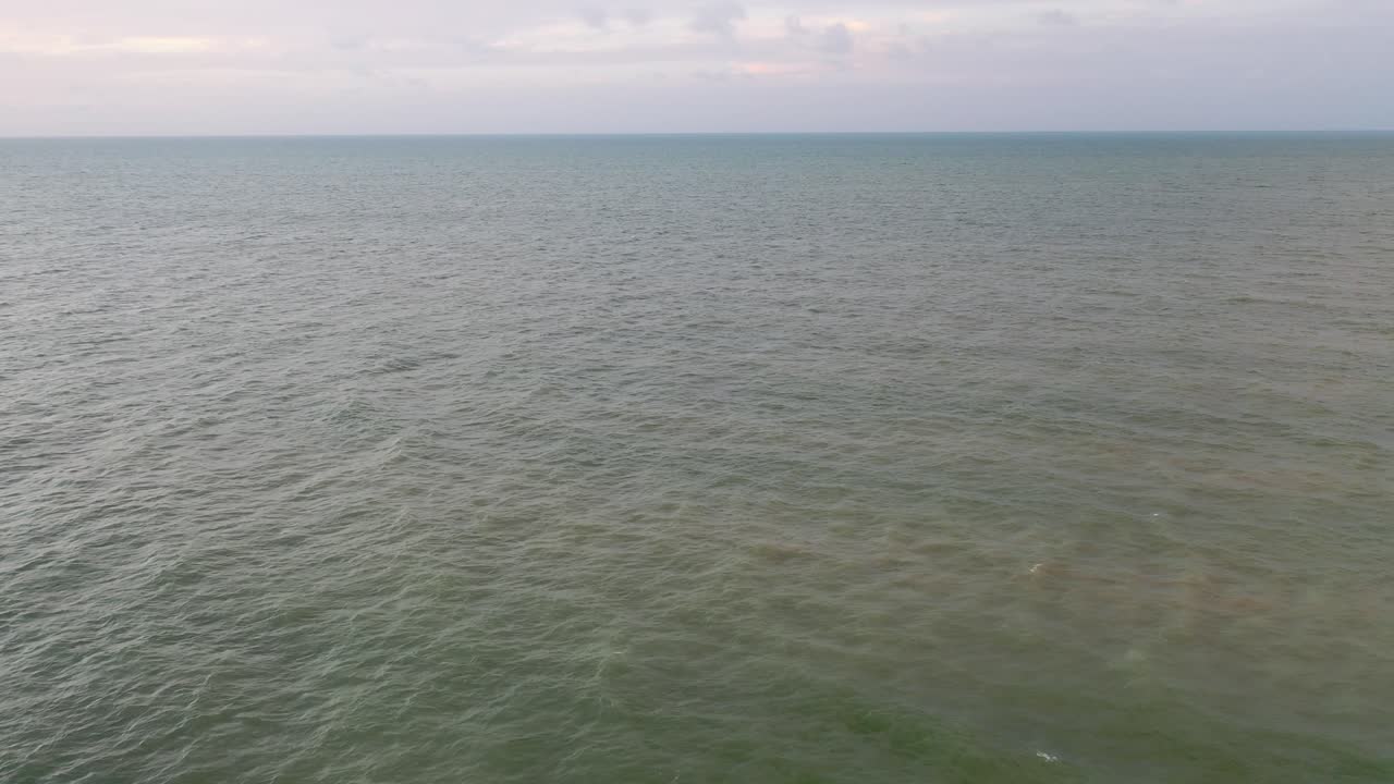 Caribbean sea of the peninsula of yucatan, Playa Chuburna, Mexico walk by the sea, surf and sand textures