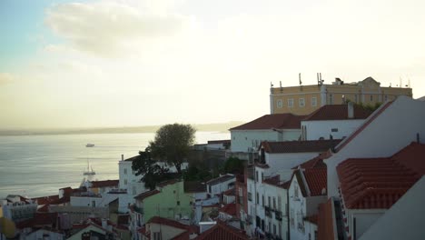 wide shot of a river and houses in lisbon