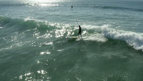 4k stand up paddle surf in beautiful cascais beach in portugal