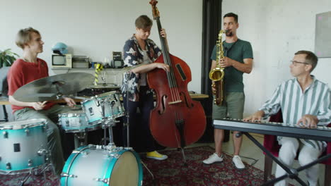 a band rehearsing jazz music in a studio