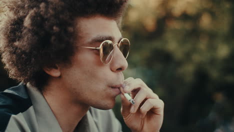 man smoking outside